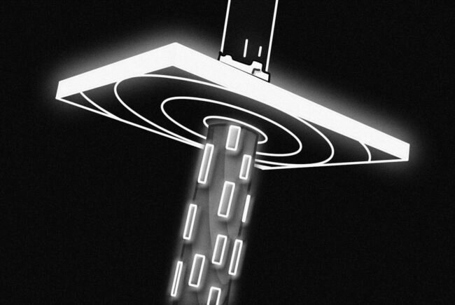 a black and white photo of a street light